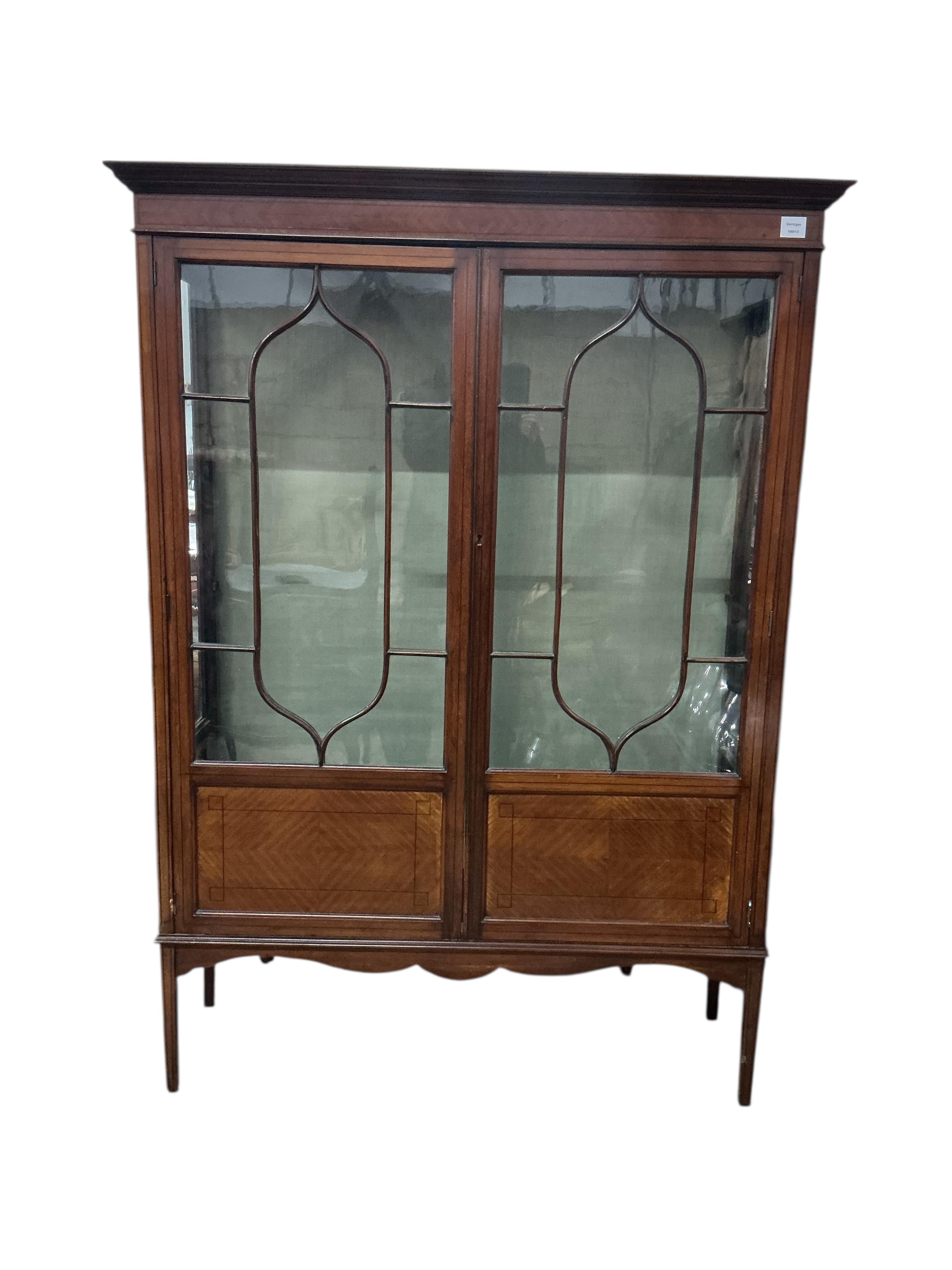 An Edwardian inlaid mahogany astragal glazed display cabinet, width 119cm, depth 35cm, height 165cm